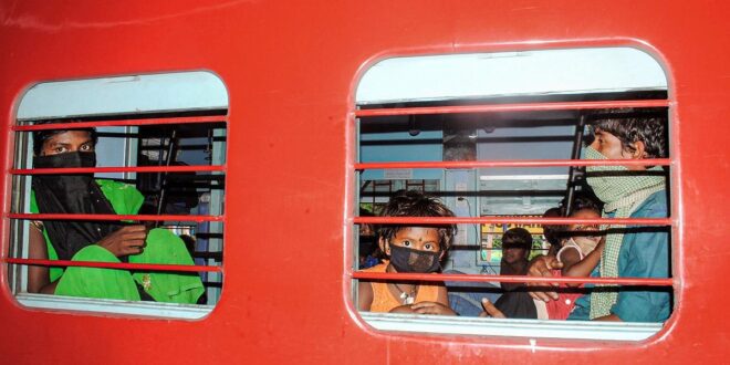 Migrants-inside-a-Shramik-Express-at-Guwahati-railway-station-May-30-2020.-Photo-PTI